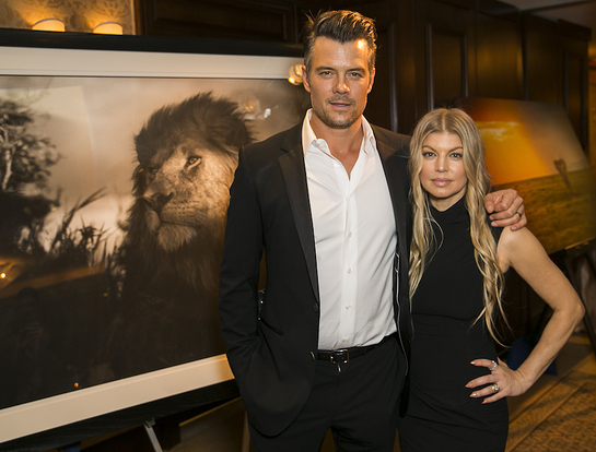 Josh Duhamel and Fergie at WildAid's LA Gala; photo in background by Nick Brandt/Big Life Foundation