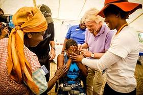 Richard Branson at Bhubezi Healthcare clinic in South Africa