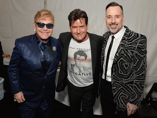 Elton John, actor Charlie Sheen and host Dave Furnish attend the 24th Annual Elton John AIDS Foundation's Oscar Viewing Party