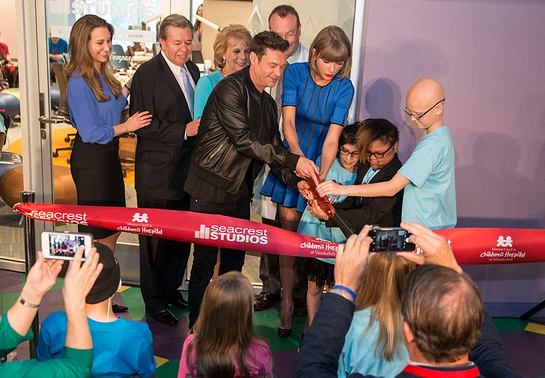 Three patients joined the Ryan Seacrest Foundation, Ryan Seacrest and Taylor Swift for the ribbon cutting. Three patients joined the Ryan Seacrest Foundation, Ryan Seacrest and Taylor Swift for the ribbon cutting.