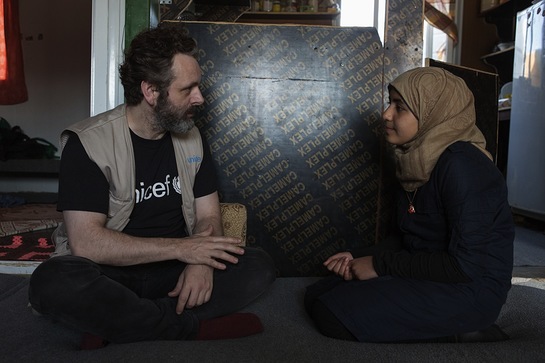 Michael Sheen talking to 13-year-old Omaymah, who has been campaigning for girls' education. Michael Sheen talking to 13-year-old Omaymah, who has been campaigning for girls' education.