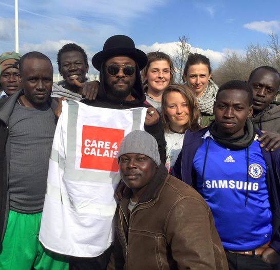 will.i.am visits refugees at Calais refugee camp