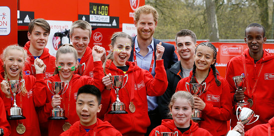 Prince Harry with winners of the 2016 Virgin Money London Marathon