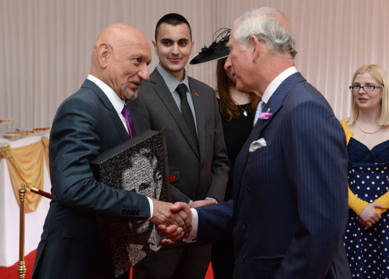 Sir Ben Kingsley presents HRH with a Digital Book of Memories