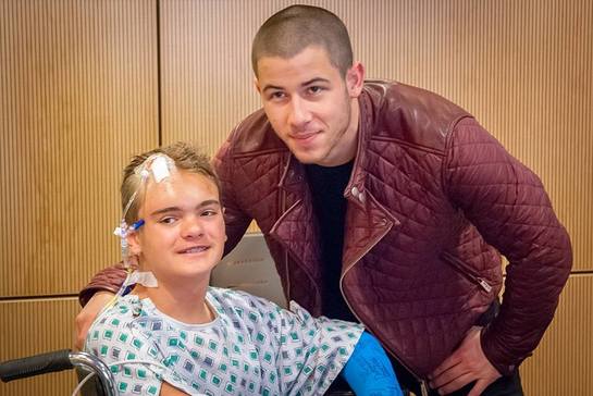 Nick Joans Meets A Patient At Children's Hospital of Orange County