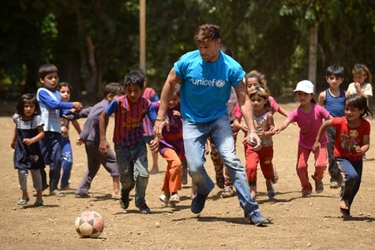 Ricky Martin plays football with Syrian refugee children at Al-Hissa informal refugee settlement in northern Lebanon