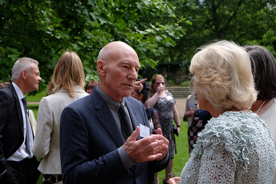 The Duchess meets Sir Patrick Stewart at a reception she hosted at Clarence House for domestic abuse survivors and campaigners