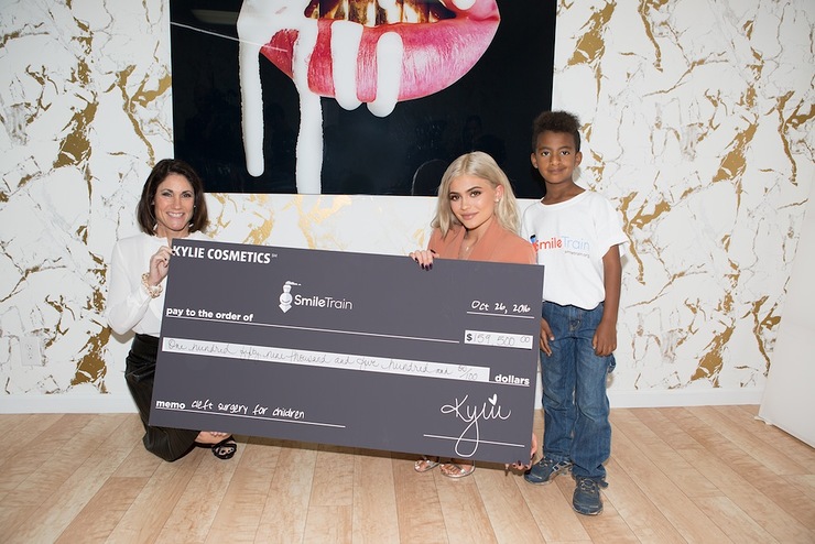 Kylie Jenner, Smile Train’s CEO, Susannah Schaefer and cleft patient, Zachary