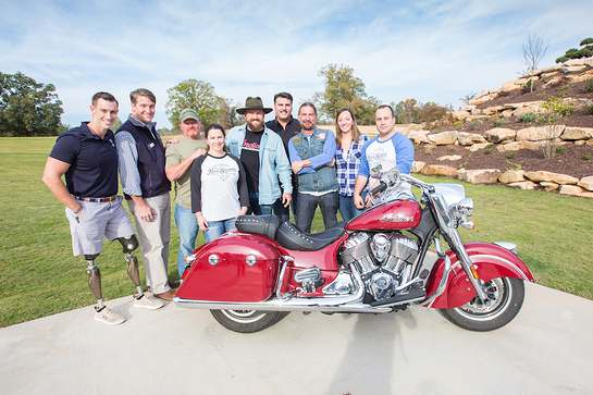 Zac Brown welcomed more than 100 veterans to Camp Southern Ground near Atlanta with a surprise acoustic performance