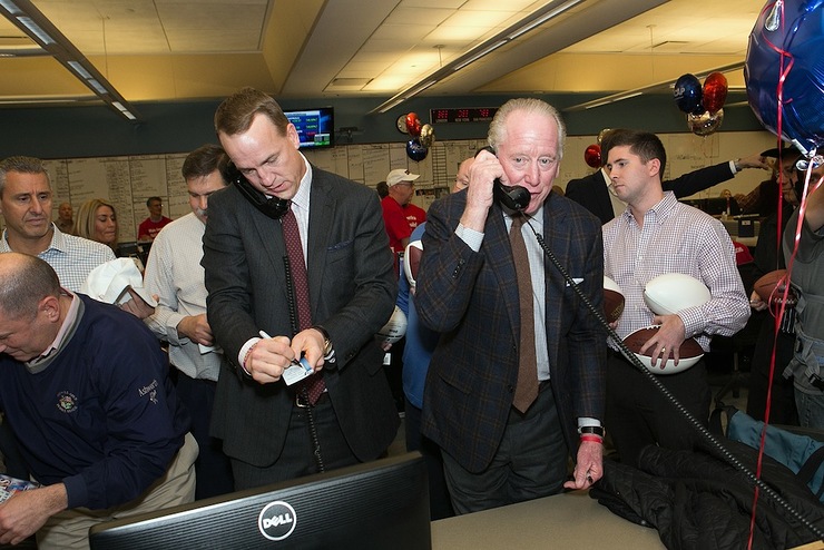 Peyton and Archie Manning took part in ICAP’s 24th annual global Charity Day at its North American headquarters in Jersey City