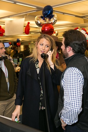  	As part of the 24th annual ICAP Charity Day, Blake Lively fields phone calls on the firm's Jersey City trading floor