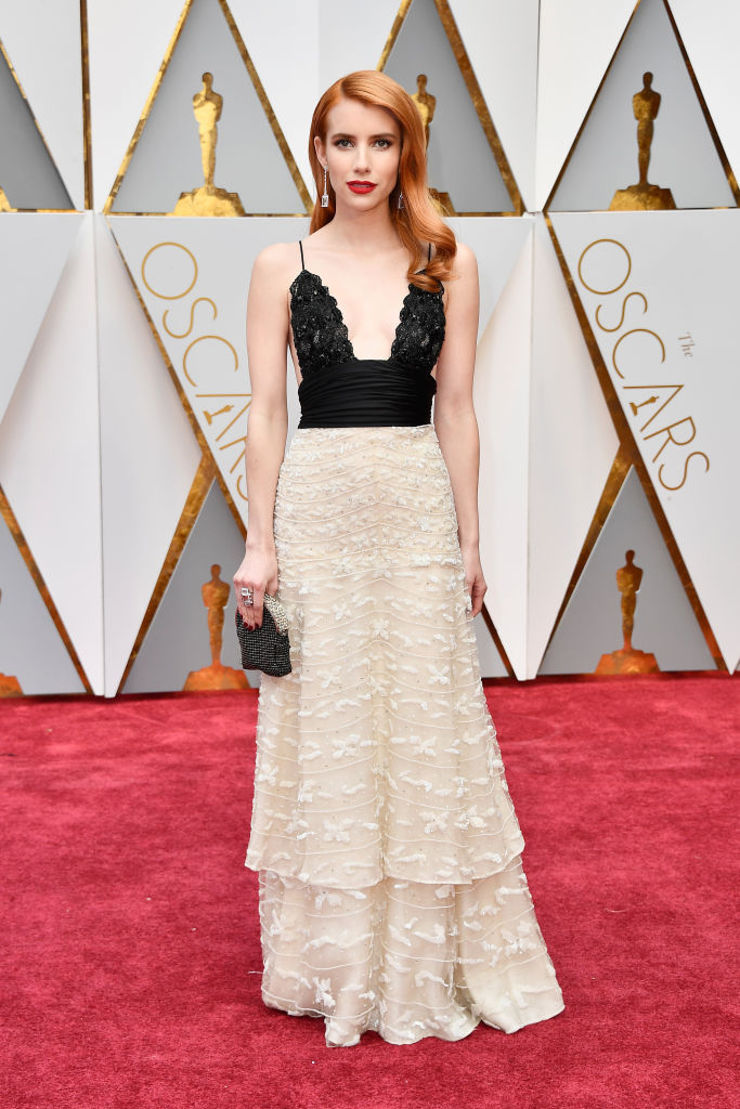 Emma Roberts wears a classic Giorgio Armani gown from his very first Prive’ collection