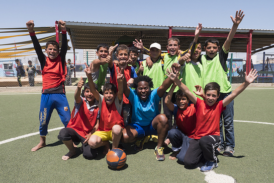 Ishmael Beah (centre) in Zaatari