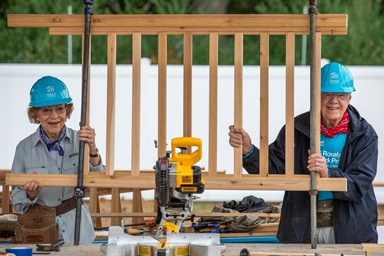 Jimmy Carter and Rosalynn Carter show off their handiwork at the 2018 Carter Work Project in Indiana