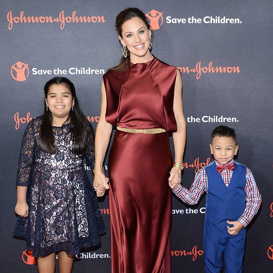 Save the Children program participants Sophia and Jakob pose for a photo with Jennifer Garner