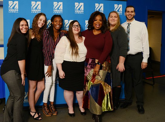  Oprah Winfrey poses with the first six UMass Lowell Oprah Winfrey Scholarship winners. 