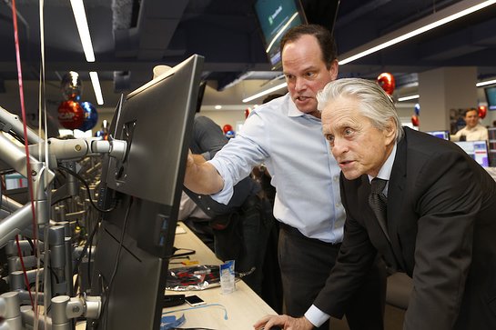 Michael Douglas raising money for Memorial Sloan Kettering during the Annual ICAP Charity Day