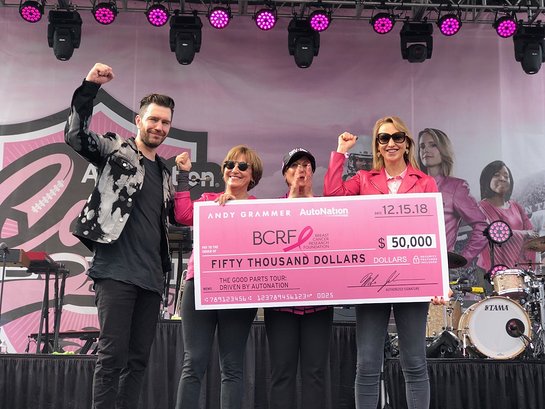 Andy Grammer Marc Cannon and Alice Jackson present a check for $50,000 to Myra Biblowit and Kinga Lampert,