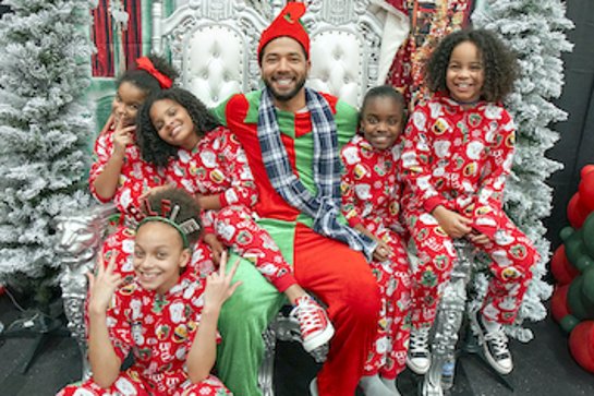 Jussie Smollett Surprises Kids at Holiday Event in Flint, Michigan