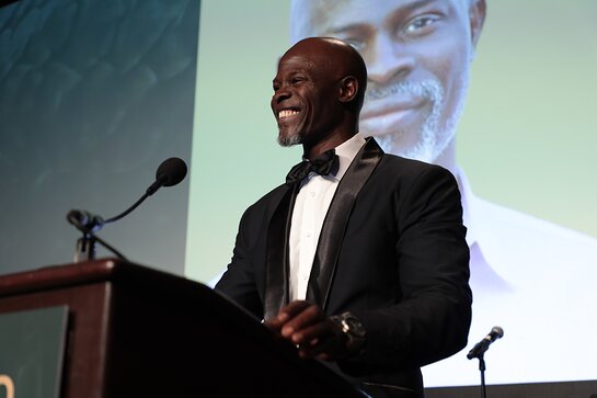 Djimon Hounsou speaks on stage at the WildAid Gala on November 9, 2019.