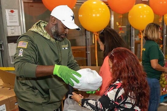 Corey Gamble helped pass out food to people in need. Corey Gamble helped pass out food to people in need.