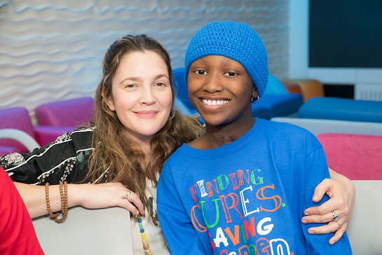 Drew Barrymore and St. Jude patient Damaya hang out at St. Jude Children's Research Hospital in 2017