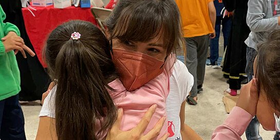 Jennifer Garner receives a hug from a girl at a temporary shelter for Afghan children Jennifer Garner receives a hug from a girl at a temporary shelter for Afghan children