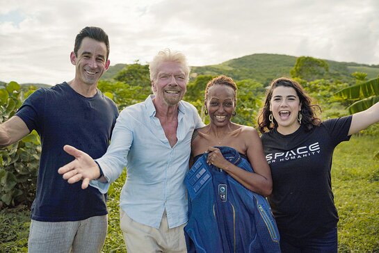 Omaze CEO and co-founder Matt Pohlson, Sir Richard Branson, Omaze winner Keisha, and Space For Humanity Executive Director Rachel Lyons