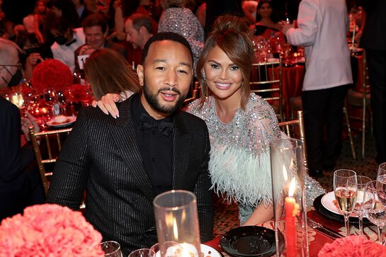John Legend and Chrissy Teigen at City Harvest 2022 Gala: Red Supper Club John Legend and Chrissy Teigen at City Harvest 2022 Gala: Red Supper Club