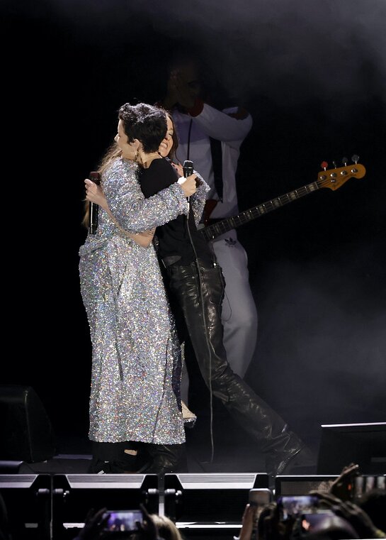 Alanis Morissette and Halsey embrace onstage at Audacy's We Can Survive