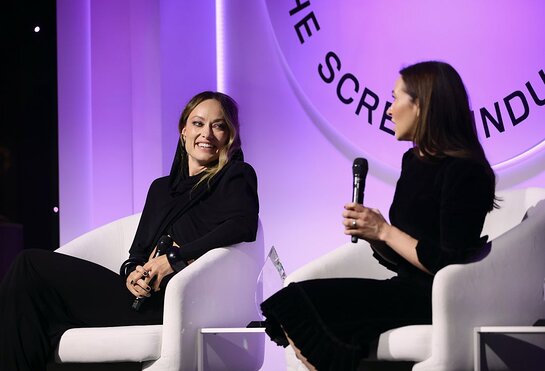 Olivia Wilde and Katie Silberman speak onstage during the WIF Honors: Forging Forward Gala