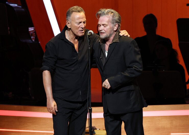 Bruce Sprinsteen and John Mellencamp perform onstage during the 17th Annual Stand Up For Heroes Benefit