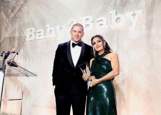 Channing Tatum and Salma Hayek Pinault pose onstage during 2023 Baby2Baby Gala