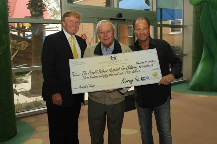 Donald Trump Stewart Rahr present Arnold Palmer with a $350,000 cash donation to Arnold Palmer Hospital for Children