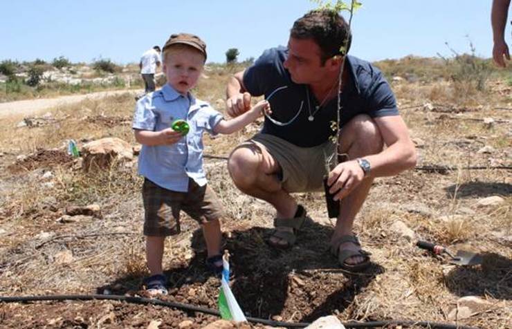 Liev Schreiber, Naomi Watts, and their two children  Sacha and Kai, helped green the land by planting a tree at Jewish National Fund Park in the Galilee on June 14th.