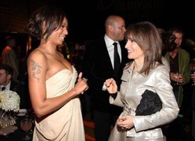 Melanie Brown and Susan Lucci catching up at the Ernest Borgnine Pre-Oscar Party