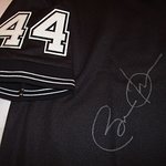 Barack Obama Signs Baseball Jersey For Charity Auction