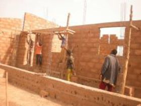 Workers put final touches on America Ferrera's school