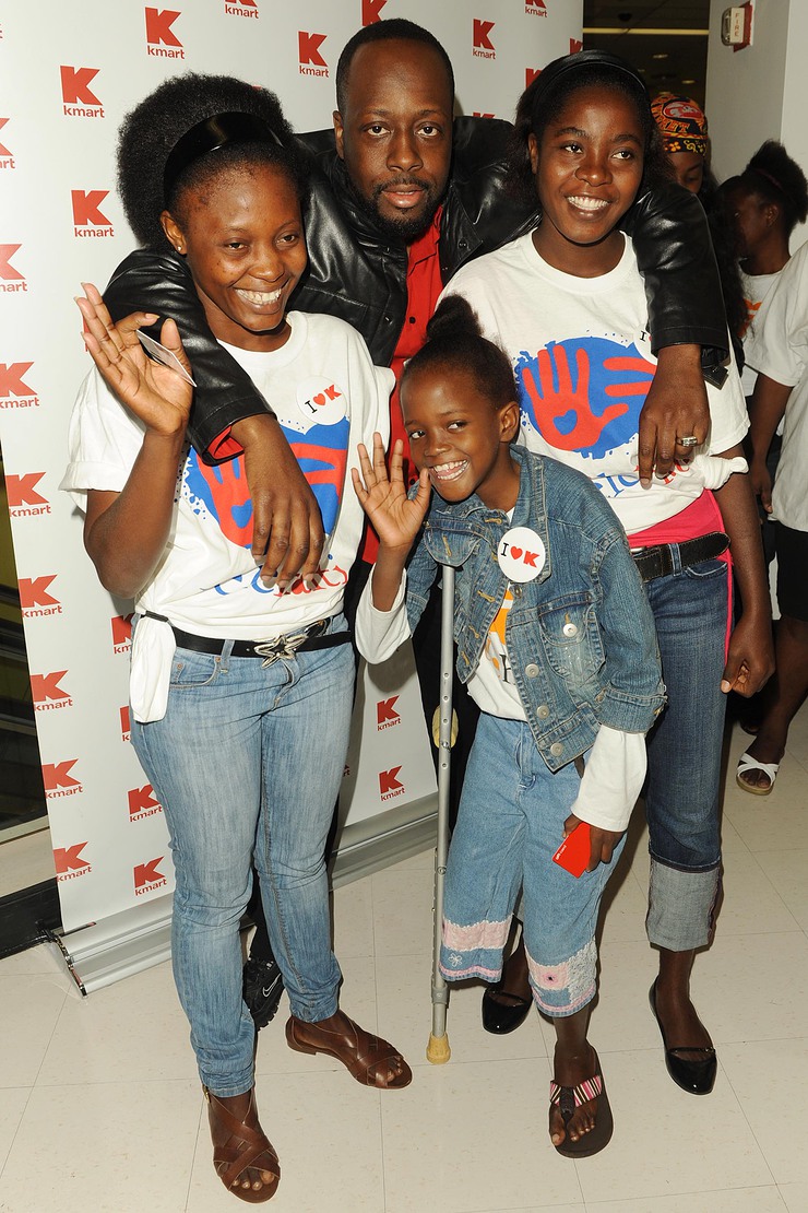 Wyclef Jean with Haitian Amputees at Kmart