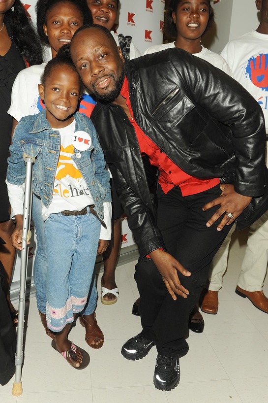 Wyclef Jean with Haitian Amputees at Kmart