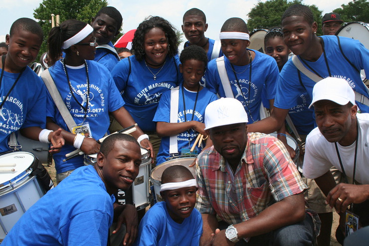 50 Cent with kids at Forever Young event