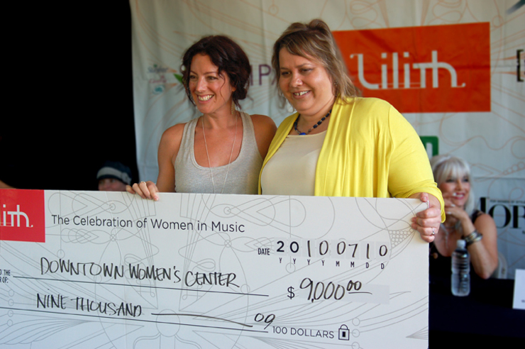 Sarah Mclachlan presents charity cheque to DWC