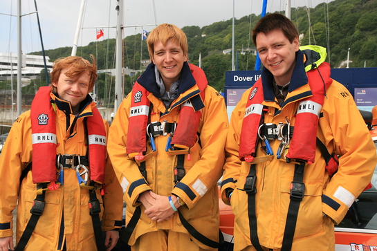 Rupert Grint, Oliver & James Phelps in RNLI Crew Kit