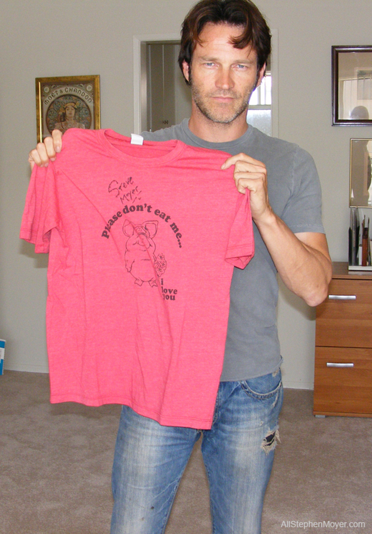 Stephen Moyer and one of the shirts he has signed for charity