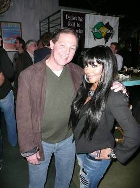  Lil Kim and real estate mogul Billy Procida joined forces at a Grateful Dead-inspired bash on Sunday to raise much-needed funds for the charity Table to Table.