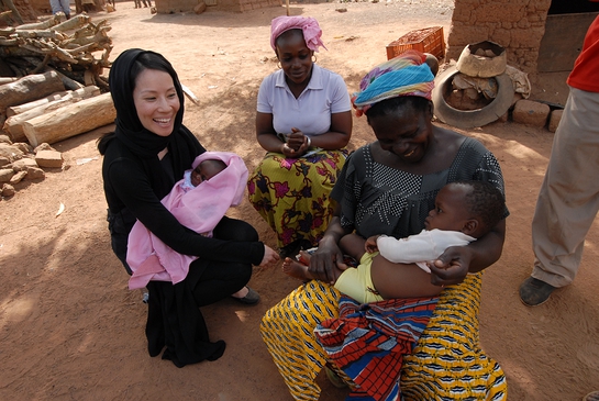 Lucy Liu on field visit with UNICEF in 2008 to Cote d'Ivoire.