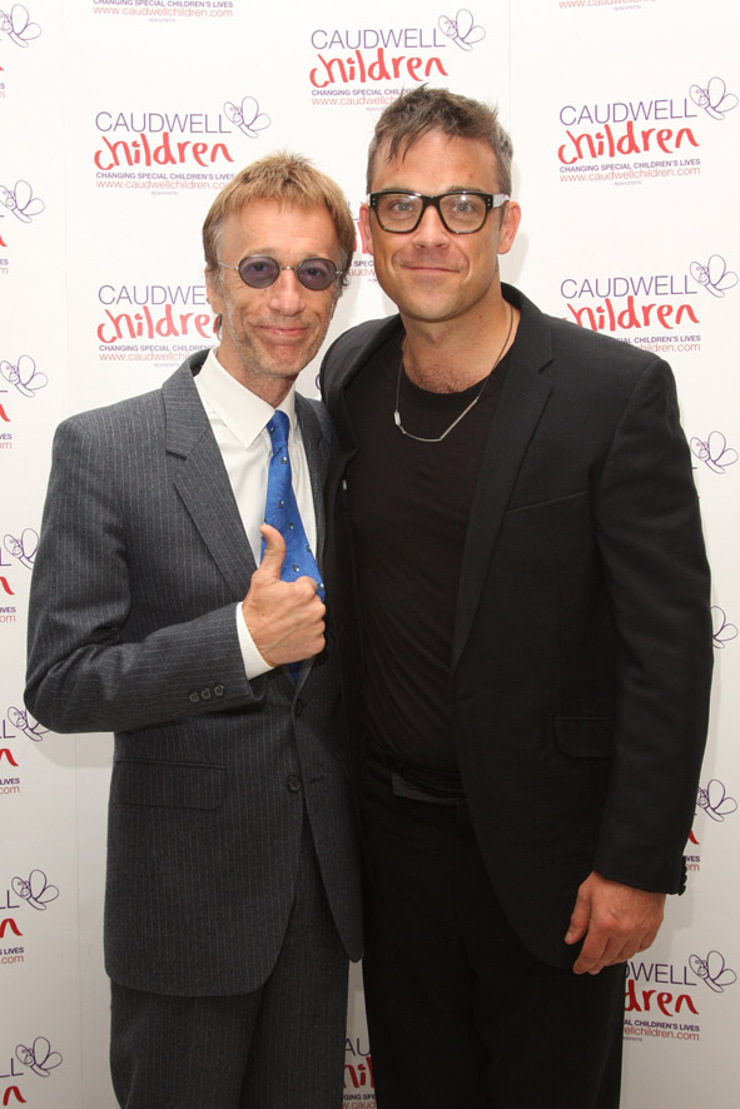 Robin Gibb and Robbie Williams at Caudwell Children Event