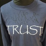 Kylie Minogue Signs Prince's Trust Shirt For Celebrity Charity Auction