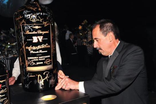 Beaulieu Vineyard Director of Winemaking Jeffrey Stambor puts the final signature on the exclusive celebrity autographed 27L Georges de Latour, benefitting the ATAS Foundation. Beaulieu Vineyard Director of Winemaking Jeffrey Stambor puts the final signature on the exclusive celebrity autographed 27L Georges de Latour, benefitting the ATAS Foundation.