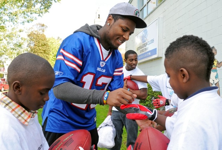 Buffalo Bills star wide receiver Stevie Johnson hands out football gear